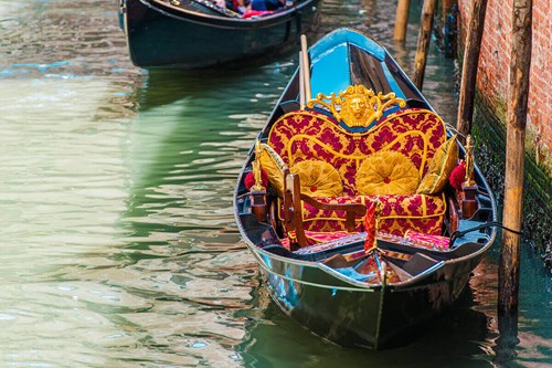 typical gondola in venice canal
