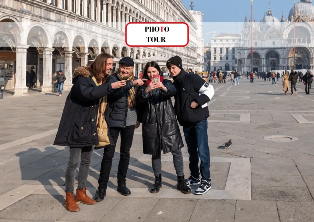 People looking at phones picture during photo tour in Venice