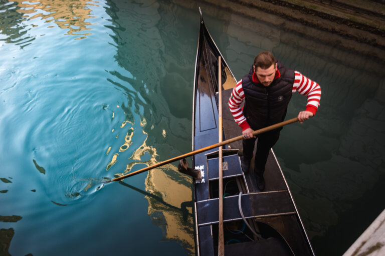 gondolier in the grand canal